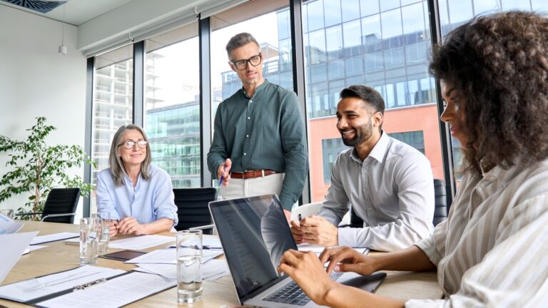 A group of workers in a meeting