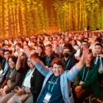 A crowd full of people celebrate in a conference hall at the Moscone Center in San Francisco for Dreamforce / Dreamforce for marketers