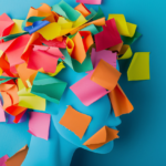 A side-profile illustration of a head covered with colorful sticky notes.