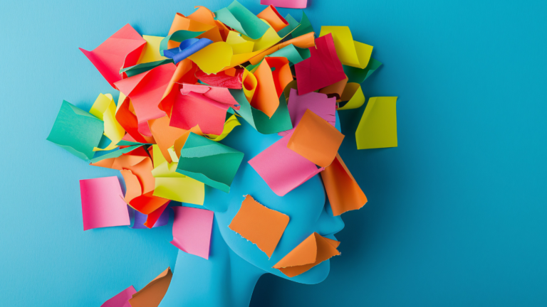 A side-profile illustration of a head covered with colorful sticky notes.