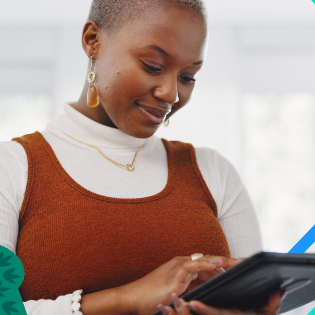 How to increase sales: A woman uses a tablet.